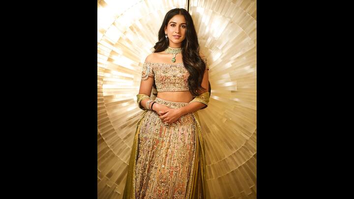 6. Timelessly Graceful Look: Radhika Merchant's multi panel chandelier inspired lehenga with pastel hues gives her a glorious vibe. The outfit has been embroidered with crystals which add a touch of luxury. The intricate detailing and soft colours elevates the look. (Image Source: Instagram/@abujanisandeepkhosla)