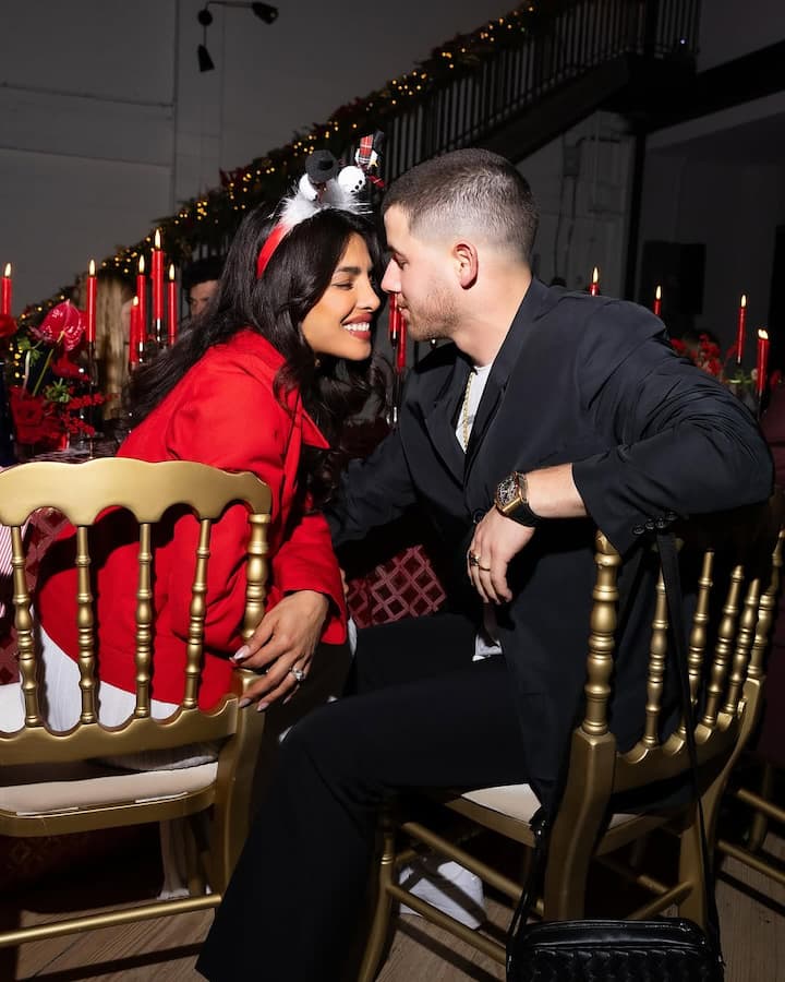 Priyanka wore a red and white dress paired with a snowman headband for the occasion.