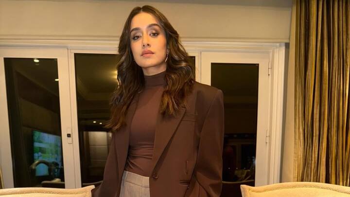 Shraddha Kapoor takes on winter attire wherein she styles herself with a classy brown blazer coupled with a matching high-neck tee. The outfit is complemented with beige pants, making the glamour-polished minimalistic combination perennially inspirational in styling matters. (Image source: Instagram/ shraddhakapoor)