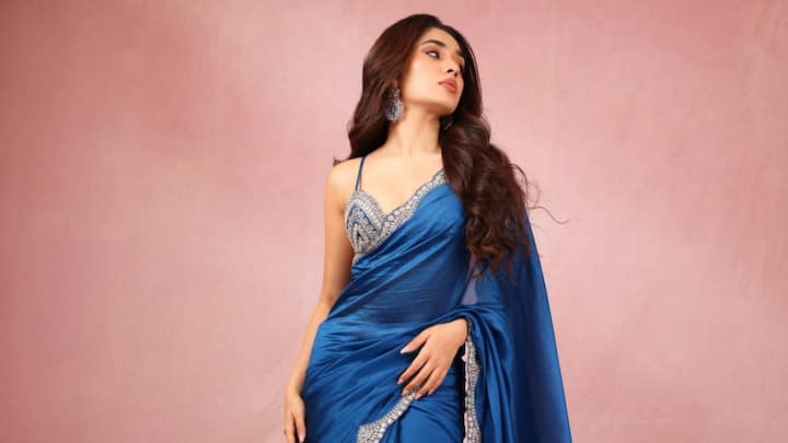 Krithi Shetty treated fans with pictures in a sea blue saree looking her most elegant self.