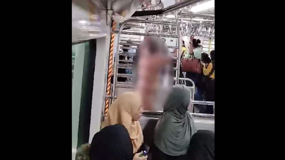 Naked Man Climbs Onto Ladies' Compartment Of Mumbai Local Train Pushed Out By Ticket Collector Naked Man Climbs To Ladies' Compartment In Mumbai Local Train, Removed By Ticket Collector