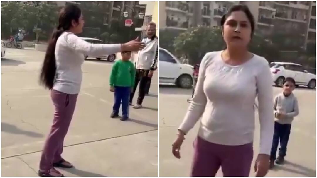 Woman In Greater Noida Society Slaps Child For Fighting With Her Kid, Hits Neighbour For Recording Her: WATCH Noida Woman Slaps 6 Year Old For Fighting With Her Son Leaves Bruise On Child Face In Greater Noida Society Woman In Greater Noida Society Slaps Child For Fighting With Her Kid, Hits Neighbour For Recording Her: WATCH