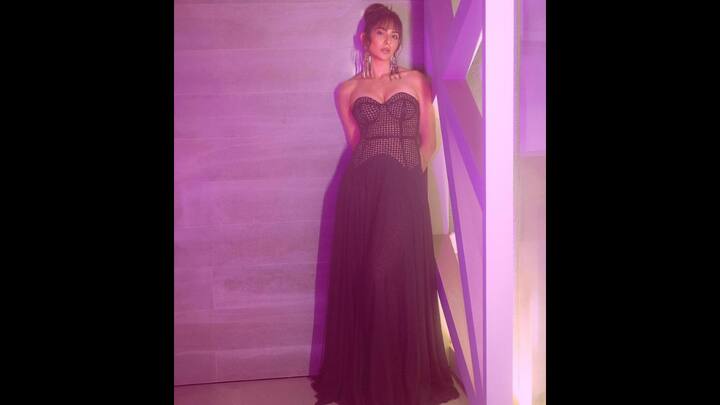2. Rakul Preet: Rakul Preet wears a strapless black gown that exudes elegance with its intricate design and flowing silhouette. The outfit, perfect for New Year party, blends glamour and sophistication. (Image Source: Instagram/@rakulpreet)