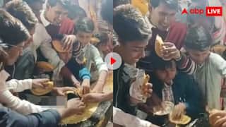 डोसा के लिए मारामारी! शादी में एक ही डोसे पर टूट पड़ी लोगों की भीड़, वीडियो देख नहीं रुकेगी हंसी