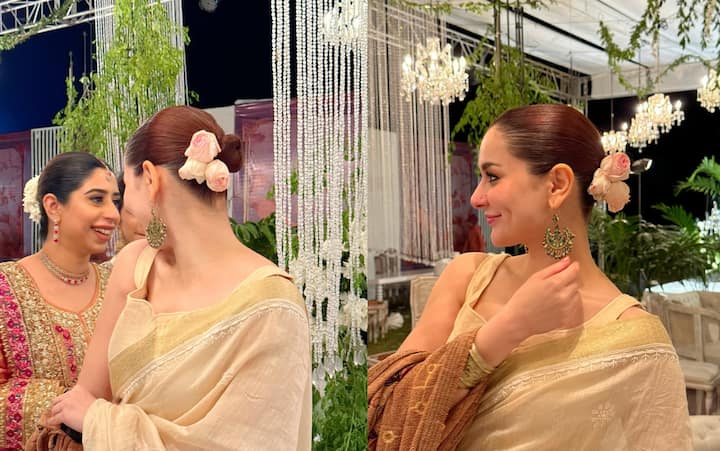 Hania had chosen a slick bun hairstyle with the saree. She decorated it with light pink roses.
