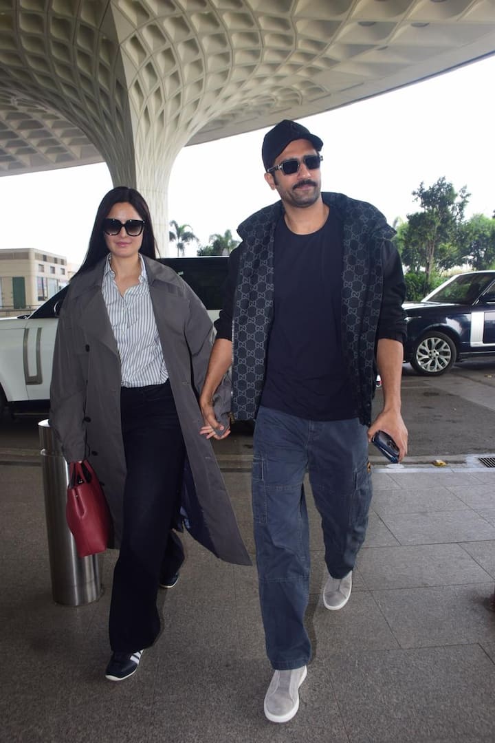 The couple's affectionate hand-in-hand walk created a picture-perfect moment.