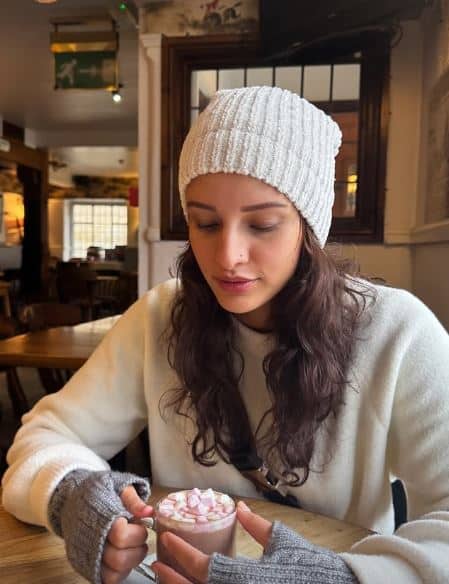 Among the highlights were photos of her feeding goats, enjoying a steaming cup of hot chocolate while wrapped in cozy winter wear, and posing inside a charming restaurant.
