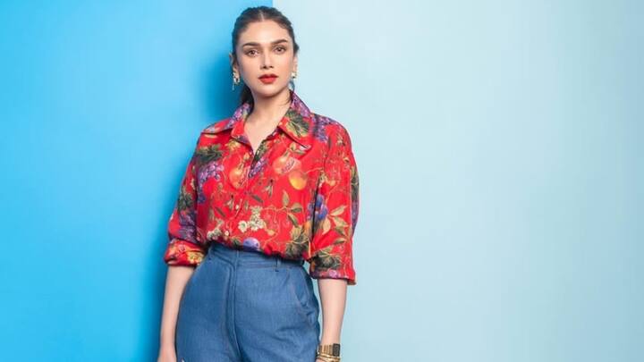 Aditi Rao Hydari pulls off a very relaxed yet stylish look in a floral red shirt paired with some classic blue jeans. Very easy to recreate, a casual yet chic look, perfect outfit to wear at Christmas while relaxing. (Image Source: Instagram/ aditiraohydari)