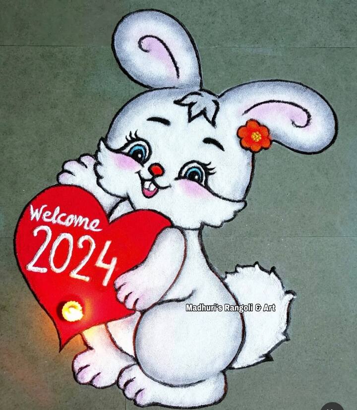 Welcome 2025 Rangoli: To please the children, you can also make a rangoli by making a portrait of a small rabbit, who is holding a heart in his hands and Welcome 2024 is written in the middle. Instead of 24, just make it 25.