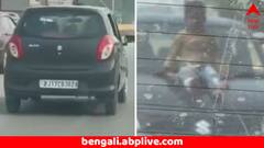 হাইওয়েতে দুরন্ত গতিতে ছুটছে গাড়ি, বনেটে বসে ১০ বছরের শিশু ! ভিডিয়ো দেখে শিউরে উঠবেন আপনিও