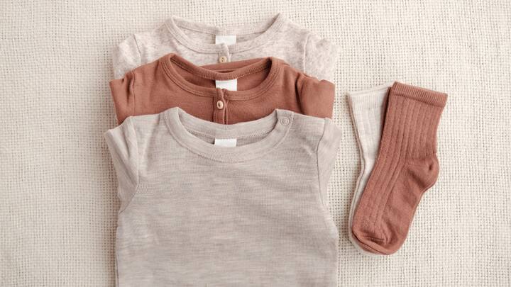 Clothes To Choose: Choose soft, breathable fabrics like cotton as base layers.  Cover exposed skin with gloves, scarves, and hats to minimize direct exposure to cold air. (Image source: Canva)