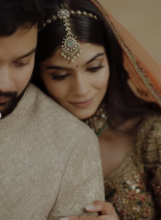 Tanvi and her groom got pictures clicked by giving different poses.