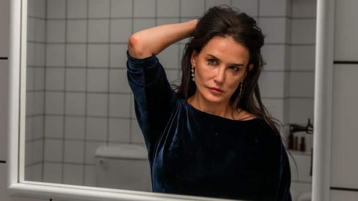The Substance (IMDb Rating: 7.4/10): The film follows the dark journey of Elisabeth Sparkle, a fading celebrity who uses a black-market drug to create a younger version of herself.