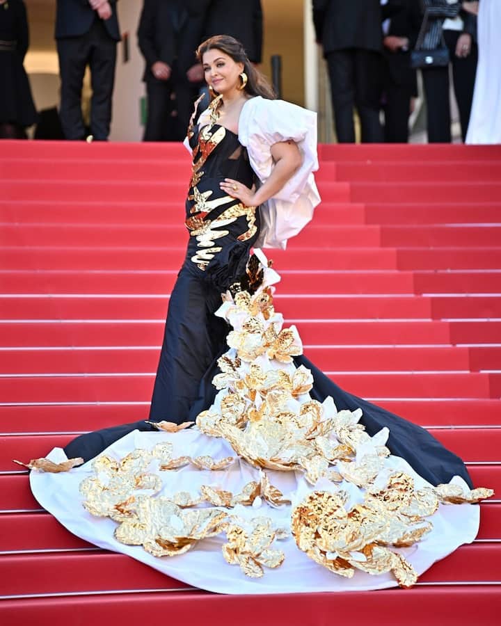 Aishwarya Rai Bachchan walked the red carpet at the screening of Francis Ford Coppola's Megalopolis at the film festival. She stunned in a Falguni Shane Peacock gown with a long trail.