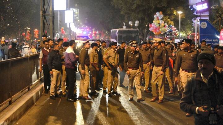 To maintain law and order situation in the city, Ahmedabad police personnel patrol on the streets on the eve of new year. Image: PTI