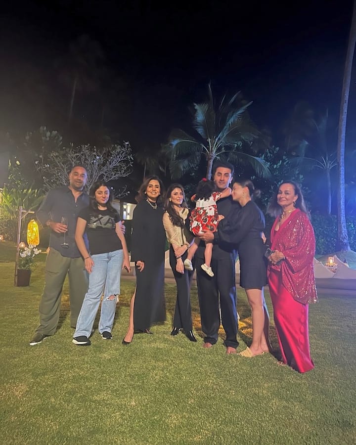 Alia and Ranbir twinned in black outfits, while Raha looked adorable in a red and white dress, complementing the festive vibes.
