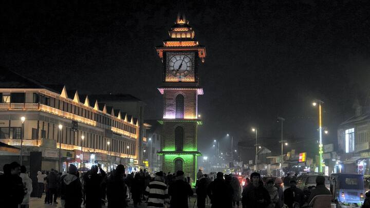 People at Srinagar's iconic Lal Chowk participate in New Year's celebrations. Image: PTI