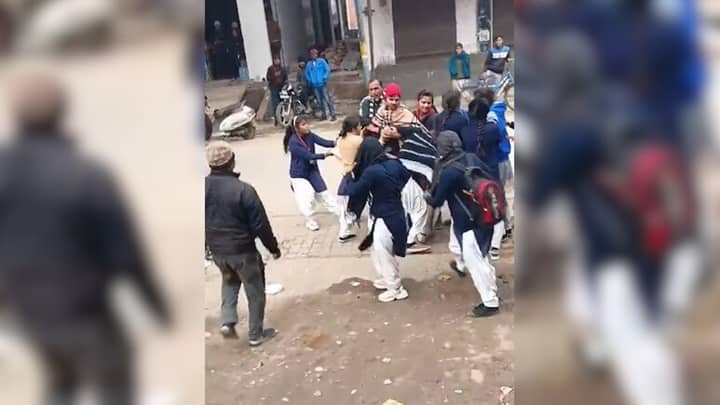 Uttar Pradesh school Girls Throw Punches And Kicks Drag Each Other By The Hair Over Boy 