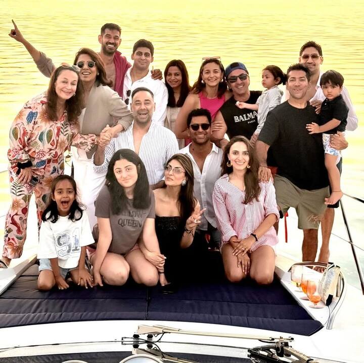 Ranbir sported a sleeveless black T-shirt and blue cap, while Alia wore a pink tank top. Raha was held by Ranbir in the family photo.