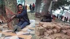 Watch: नाराज महिला ने पति को विवाद बढ़ने पर पेड़ से बांधा, बेटे के साथ मिलकर की पिटाई