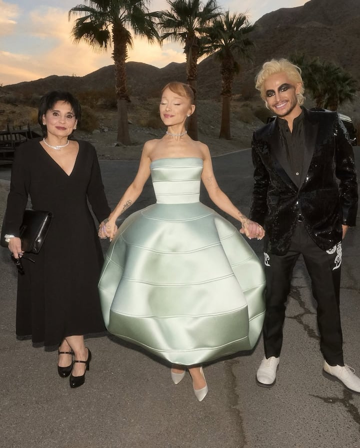 She paired the showstopping dress with matching silver Jimmy Choo Romy pumps.