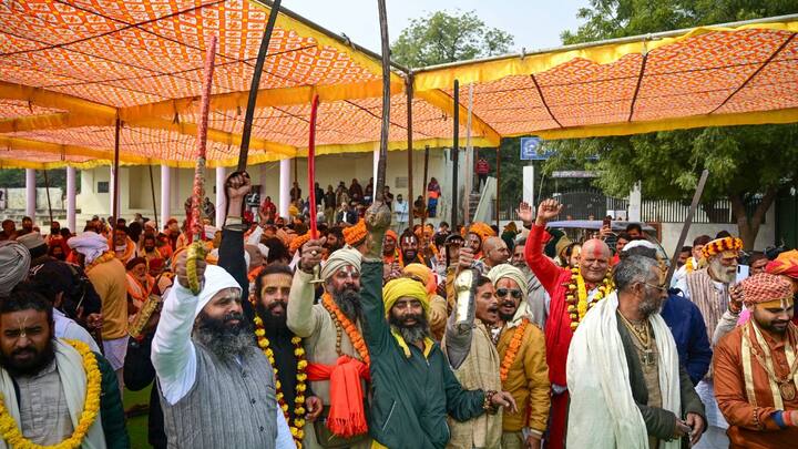 Hindu seers from 'Shri Digambar Akhara' participate in the 'Peshwai' procession, marking the arrival of sadhus and other members of an 'akhara' or sect for the annual pilgrimage in Prayagraj. Image: PTI