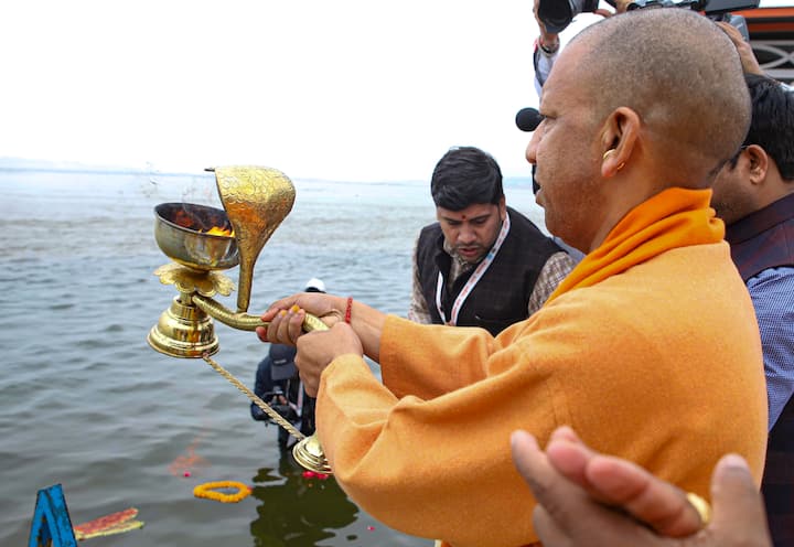 Uttar Pradesh Chief Minister Yogi Adityanath offers prayers during inspection of preparations ahead of Mahakumbh 2025, in Prayagraj, Tuesday, Dec. 31, 2024. (Image Source: PTI)