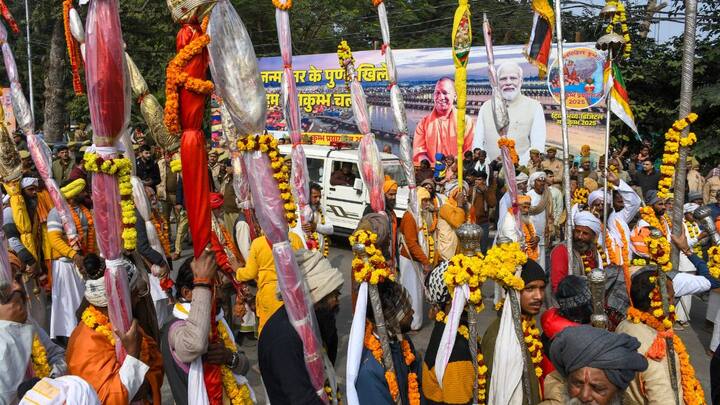 Sadhus from 'Shri Panch Digambar Ani Akhara', 'Shri Panch Nirmohi Ani Akhara', and 'Shri Panch Nirvani Ani Akhara' participate in the  'Chavni Pravesh', the royal entry procession for Maha Kumbh Mela 2025, towards Sangam in Prayagraj. Image: PTI