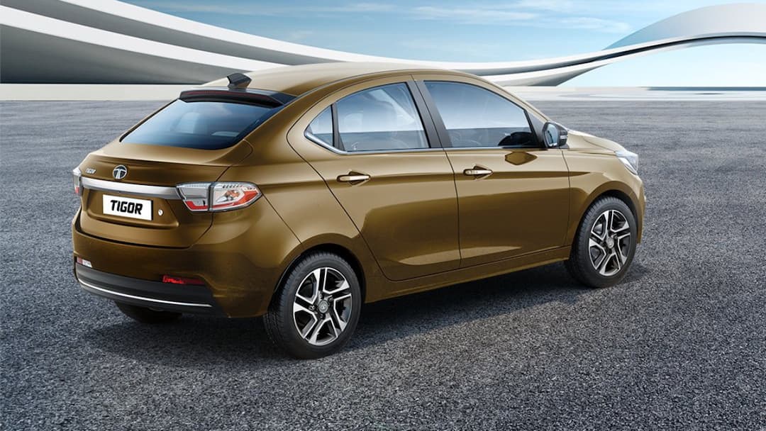 Tata Tigor 2025 Facelift Launched in India Check Price Features Details Tata Tigor 2025: మార్కెట్లోకి కొత్త టాటా టిగోర్ ఎంట్రీ - ధర ఎంత? ఫీచర్లు ఎలా ఉన్నాయి?