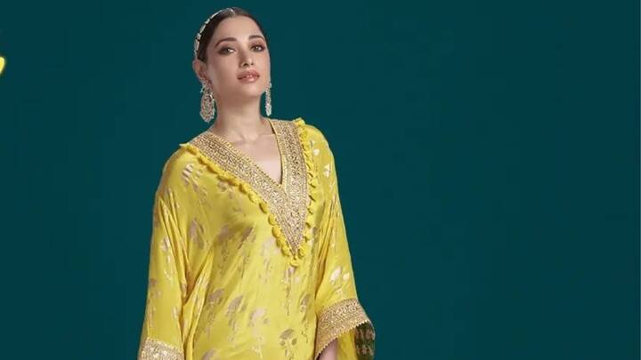 Tamannaah's simple yet festive yellow suit enhanced the beauty of looking elegant. Add to that slim, less makeup, and glamorous hair with a chic hair accessory, she wore traditional chandbalis, which merely dignified perfection for festive celebrations. (Image Source: Instagram/ tamannaahspeaks)