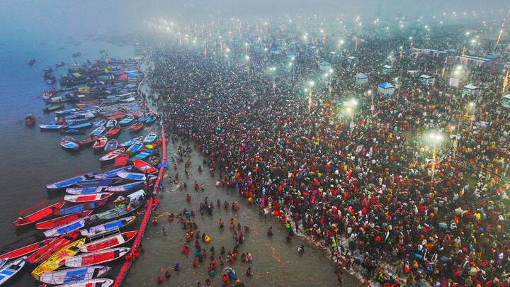 In this image released by @PIB_India on X on Jan. 13, 2025, Devotees take a holy dip at Sangam during Maha Kumbh Mela 2025, in Prayagraj, Uttar Pradesh.
