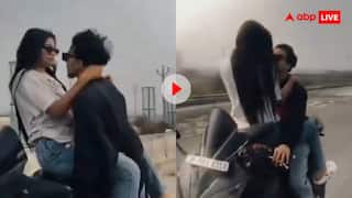 गर्लफ्रेंड को गोद में बिठाकर बाइक चलाते हुए बनाई रील, अब पुलिस देगी इनाम