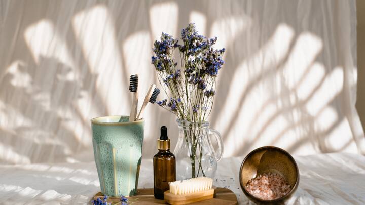 Ease Into The Evenings: After a hectic day, you deserve a break. Relaxing scents like Roman chamomile and ylang-ylang can help you wind down. Whether it’s a warm bath, a spritz of a pillow mist, or a calming tea, these simple rituals help you sleep better. Managing stress during the day and getting good sleep at night boosts mental well-being. Aromatherapy can help keep stress low and sleep restful with natural ingredients. (Image Source: Canva)