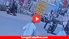 ফোন ঘাঁটতে ঘাঁটতে রাস্তা পেরোচ্ছিলেন, চলন্ত বাইক থেকেই যুবককে চড় কষালেন পুলিশ; ভাইরাল ভিডিয়ো