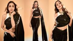 51 की उम्र में ब्लैक साड़ी पहन नागिन सी बलखाती दिखीं मलाइका अरोड़ा, तस्वीरों ने हाई किया इंटरनेट का पारा