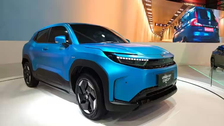toyota urban cruiser ev first look appeared in the auto expo 2025 india bharat mobility global expo Auto Expo 2025: ઓટો એક્સ્પૉમાં જોવા મળ્યો Toyota Urban Cruiser EV નો ફર્સ્ટ લૂક, અહીં જાણો ફિચર્સ