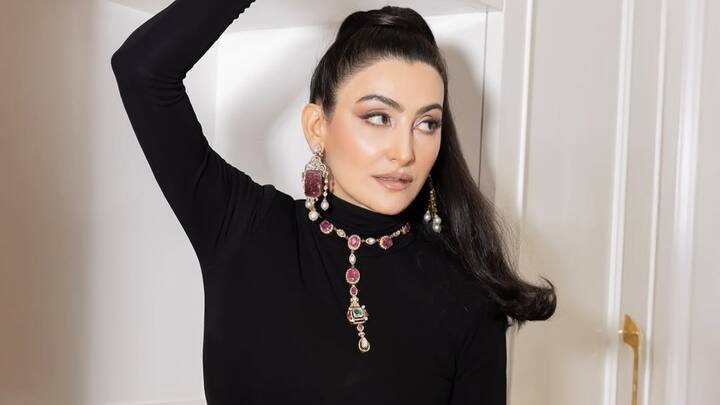 ecently, she shared stunning pictures in a black Elisabetta Franchi gown, showcasing her refined taste in couture fashion. The gown, with its sleek, figure-flattering silhouette, perfectly complemented Shalini's graceful persona.