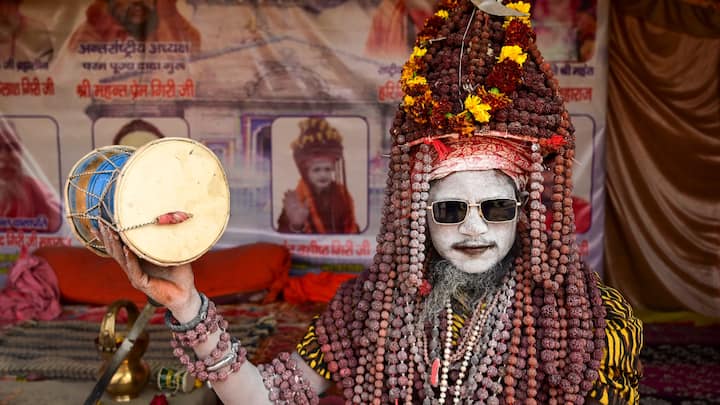 A 'sadhu' at his tent during Maha Kumbh Mela 2025, in Prayagraj, Uttar Pradesh. (Photo: PTI)