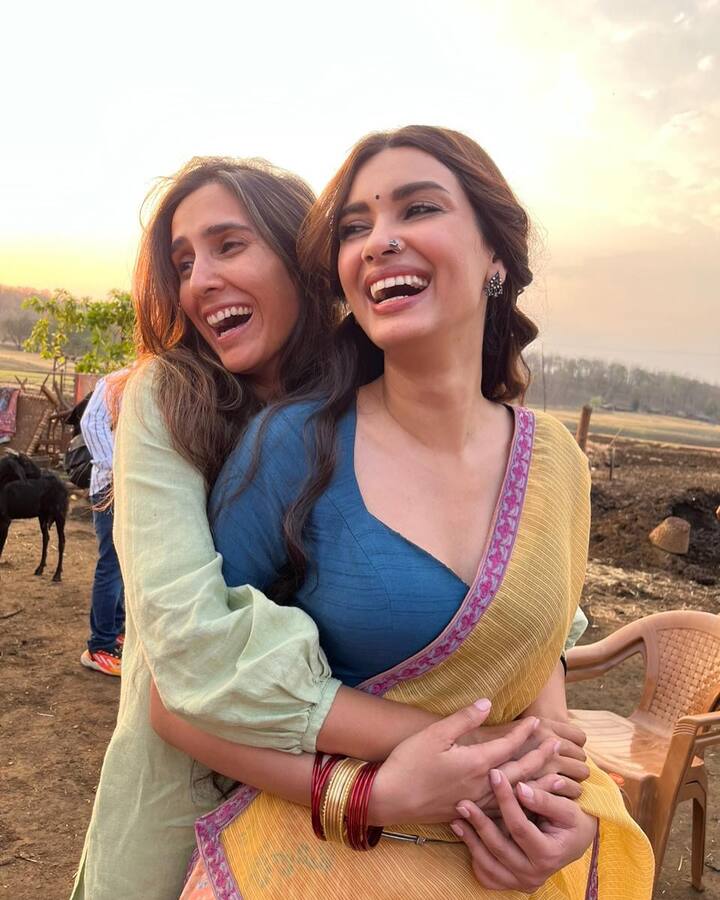 In another snap, Diana is seen sharing a light moment with the crew, flashing her radiant smile. Her camaraderie with the team speaks volumes about the positive atmosphere on set.