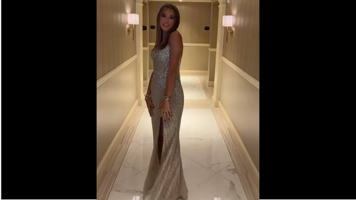 Kai stunned in a dazzling champagne silver gown for the Inaugural Ball. Adorned with shimmering sequins and beadwork, the outfit has a plunging sweetheart neckline. (Image Source: Instagram/@globalviralvideo)
