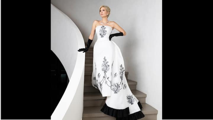 Ivanka Trump, the First Daughter, attended the Inaugural Ball with her husband, Jared Kushner, in a breathtaking white strapless outfit. Her ensemble was a replica of Audrey Hepburn's iconic floral gown from the classic film 'Sabrina'. (Image Source: Instagram/@ivankatrump)