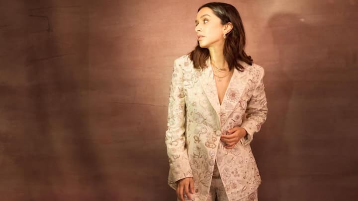 Shraddha Kapoor looks glamorous in a beige embellished suit with subtle prints. The intricate detailing and her minimalistic style exuded understated elegance, making her look perfect for a modern ethnic-inspired outfit. (Image Source: Instagram/ shraddhakapoor)