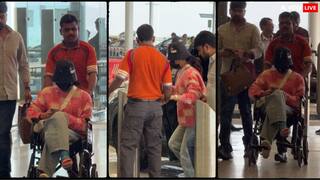 मास्क से मुंह छिपाकर एयरपोर्ट पर लंगड़ाती दिखीं पुष्पा की 'श्रीवल्ली', व्हीलचेयर पर बैठकर अंदर गईं रश्मिका