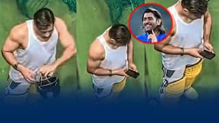 MS Dhoni Rare Seen With Mobile