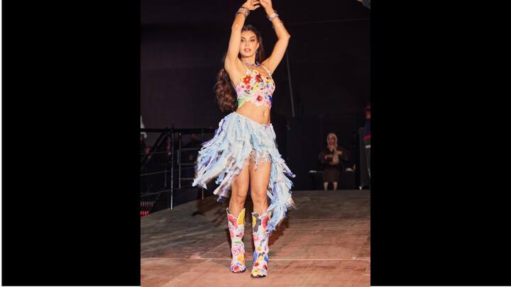 2. Jacqueliene Fernandez: Jacqueliene dazzled in an asymmetrical, layered skirt with delicate ruffles. She paired her skirt with a floral crop top adorned with embellishments. The actress completed her fit with floral high boots. (Image Source: Instagram/@jacquelienefernandez)