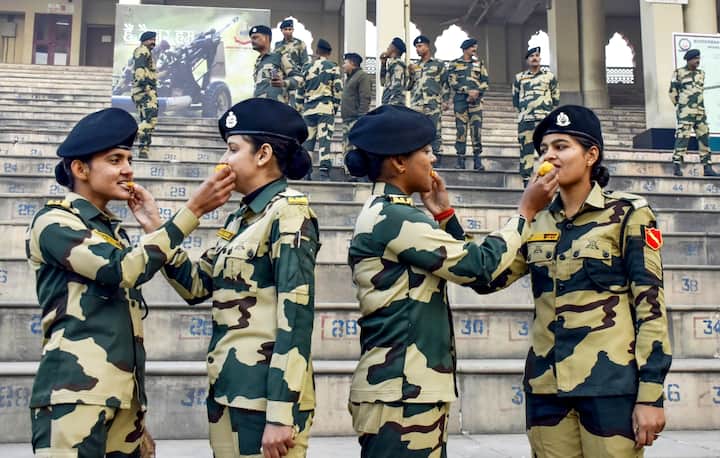 BSF personnel exchanged sweets and celebrated the occasion with patriotic fervour. (PTI Photo)