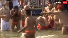 भगवा कपड़े पहन अमित शाह ने संगम में लगाई डुबकी, फिर संतों ने कराया स्नान, देखें तस्वीरें