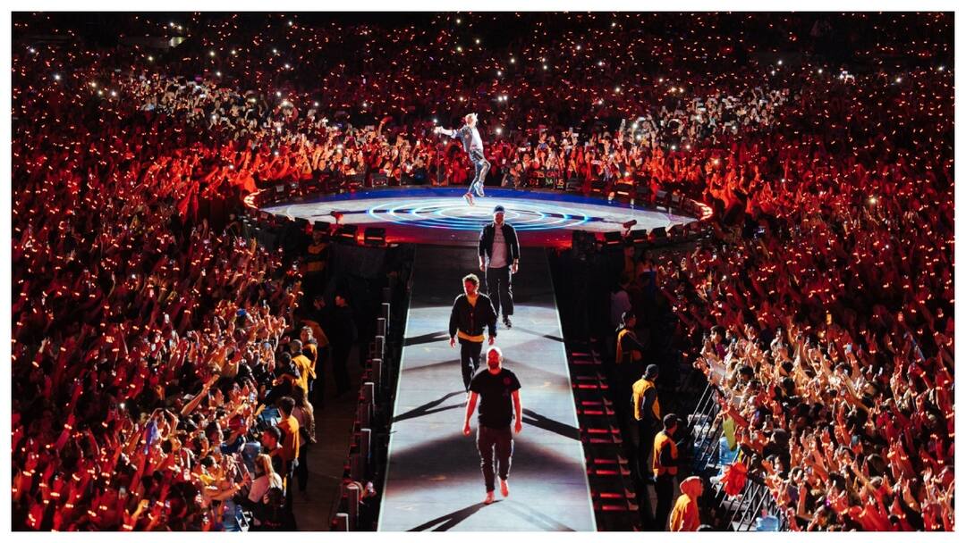 PM Modi points to Coldplays sold out shows in India as evidence of live concerts  huge potential PM Modi: ‘కోల్డ్​ ప్లే’.. ఎవరి నోట విన్నా ఇదే మాట.. ప్రధాని మోదీ కూడా..