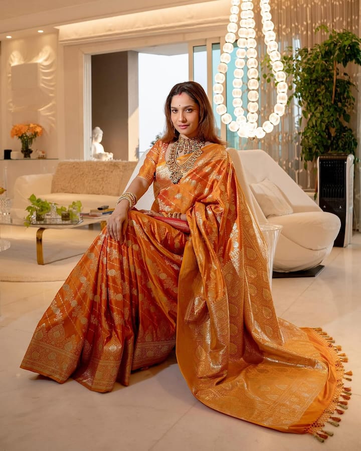 This orange and yellow color Banarasi saree of the actress is also a <a href=