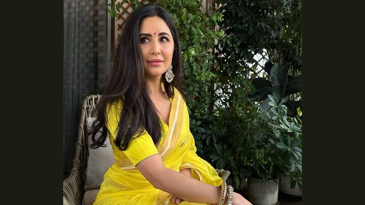 Katrina Kaif wore a bright yellow silk saree, with traditional golden bangles and earrings. Minimal makeup and a classic red bindi added a timeless festive charm to her look. (Image Source: Instagram/ katrinakaif)